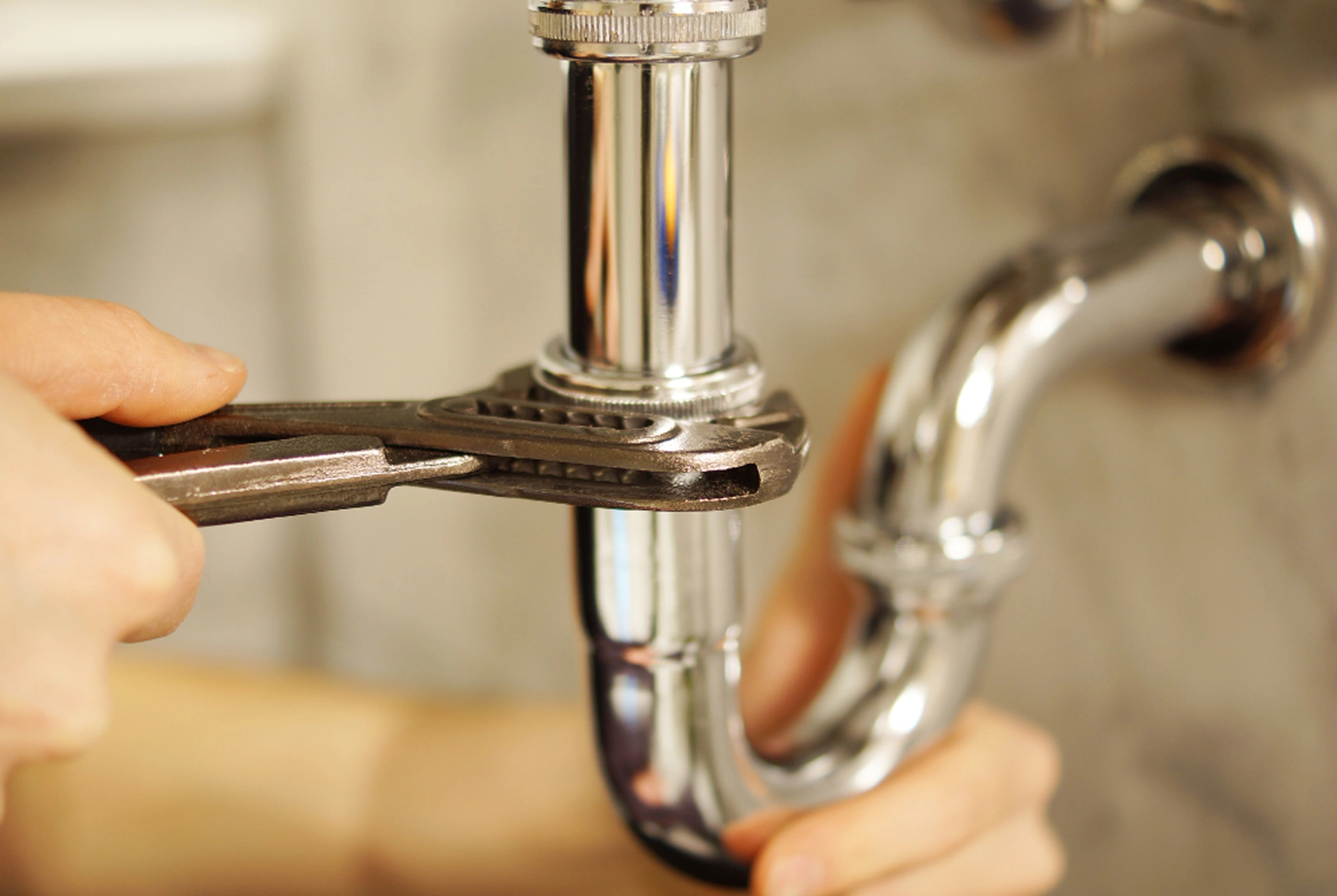 Emergency plumber fixing burst pipe at residential property in Coimbatore